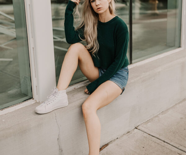 femme_avec_pullover_vert