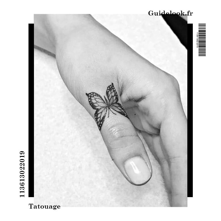 tatouage doigt papillon pouce